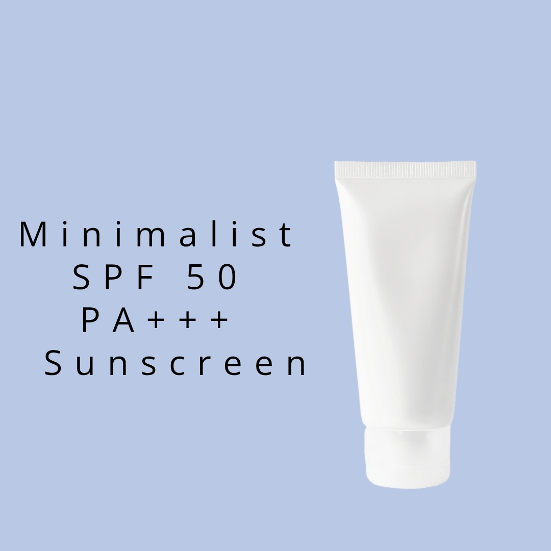 Minimalist SPF 50 PA+++ sunscreen tube on a light blue background.